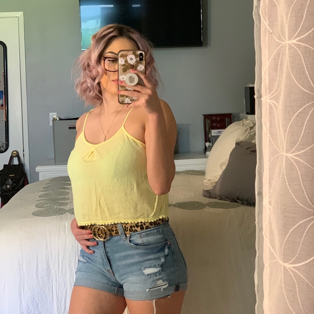 Woman’s yellow crop top
